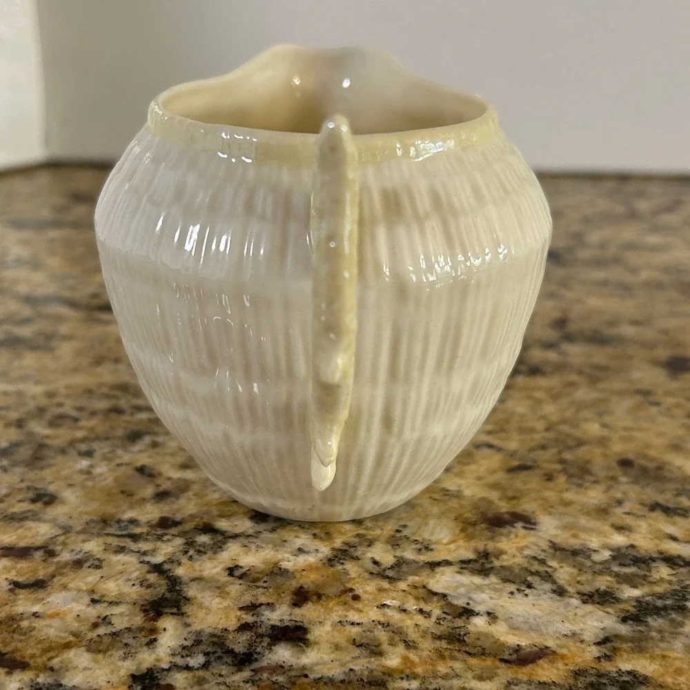 Belleek Neptune Creamer 3.25in Ivory Yellow Shell Pattern Coral Handle Vintage